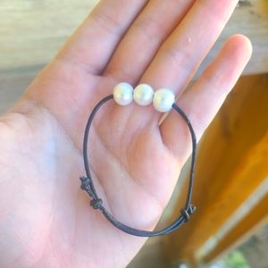 South sea pearl and leather bracelet.